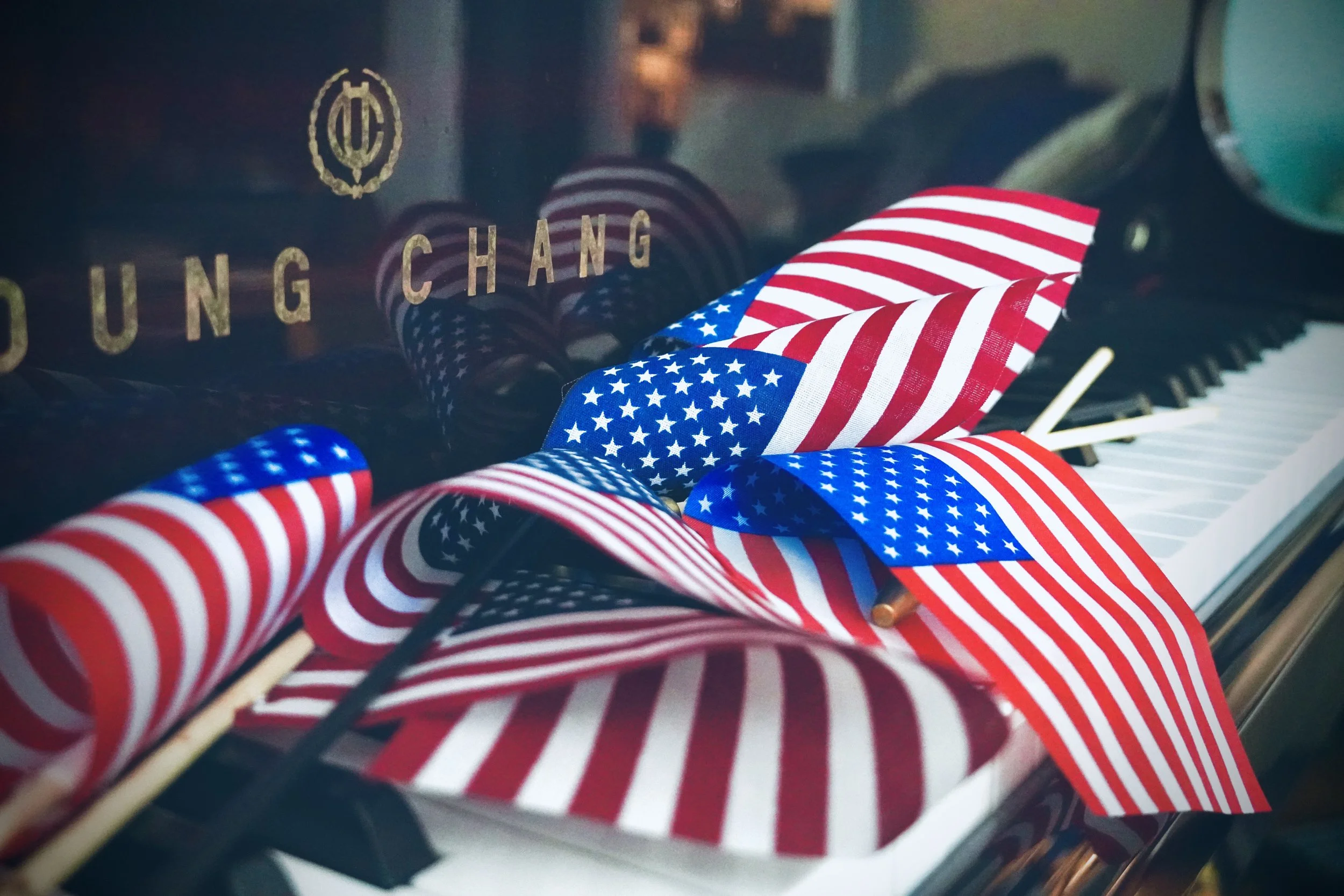 Young Chang piano with American flags